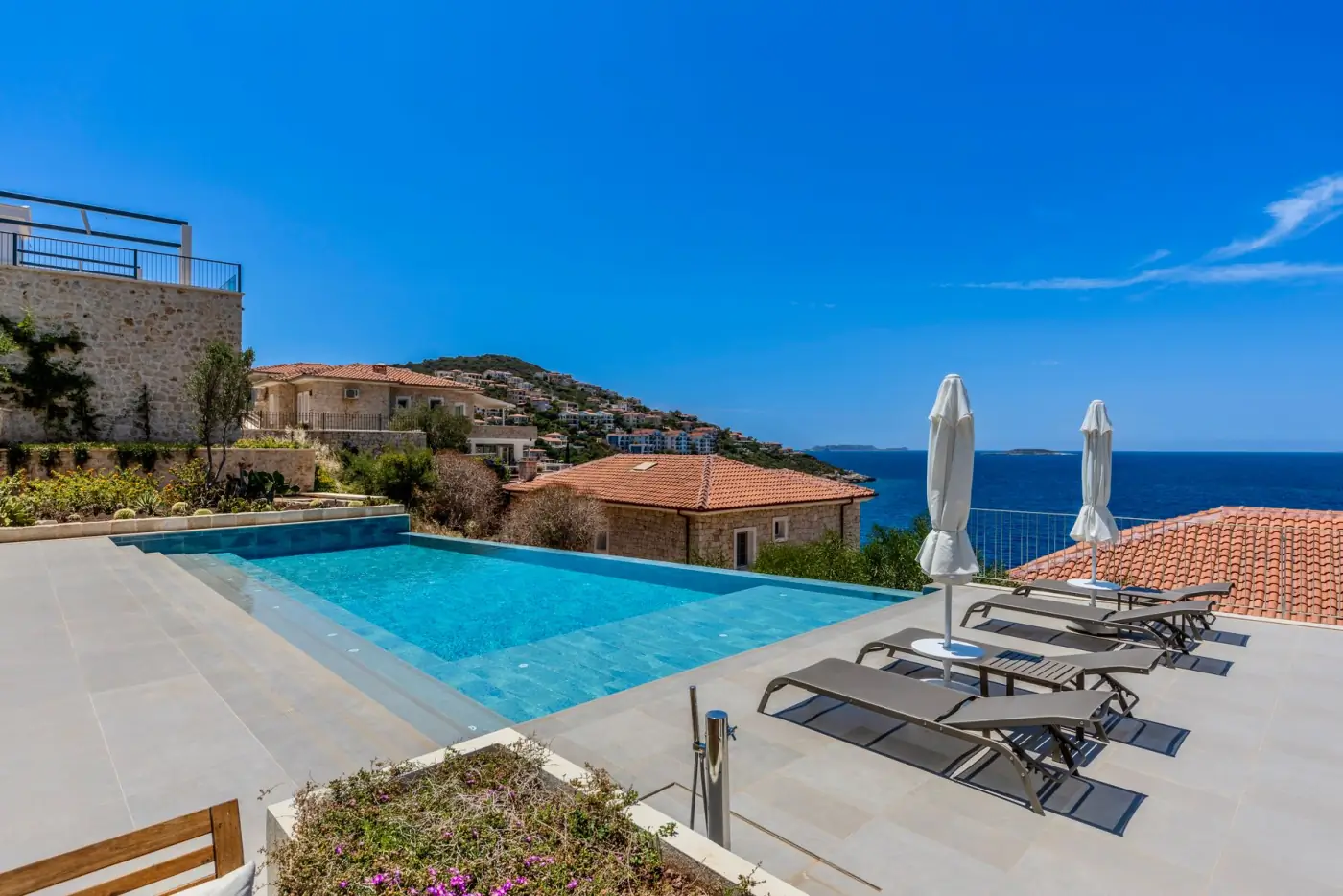 Infinity pool overlooking a Mediterranean bay on the French Riviera